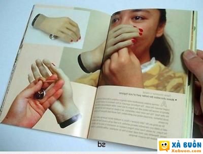  =))  tay giả che miệng khi xỉa răng cho mấy đứa không thích dùng tay thật  :3 